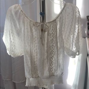 This is a sheer white top from Hollister.